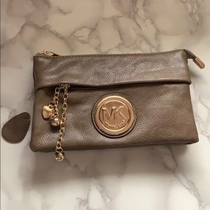 Brand new Michael Kors wallet/cross body.